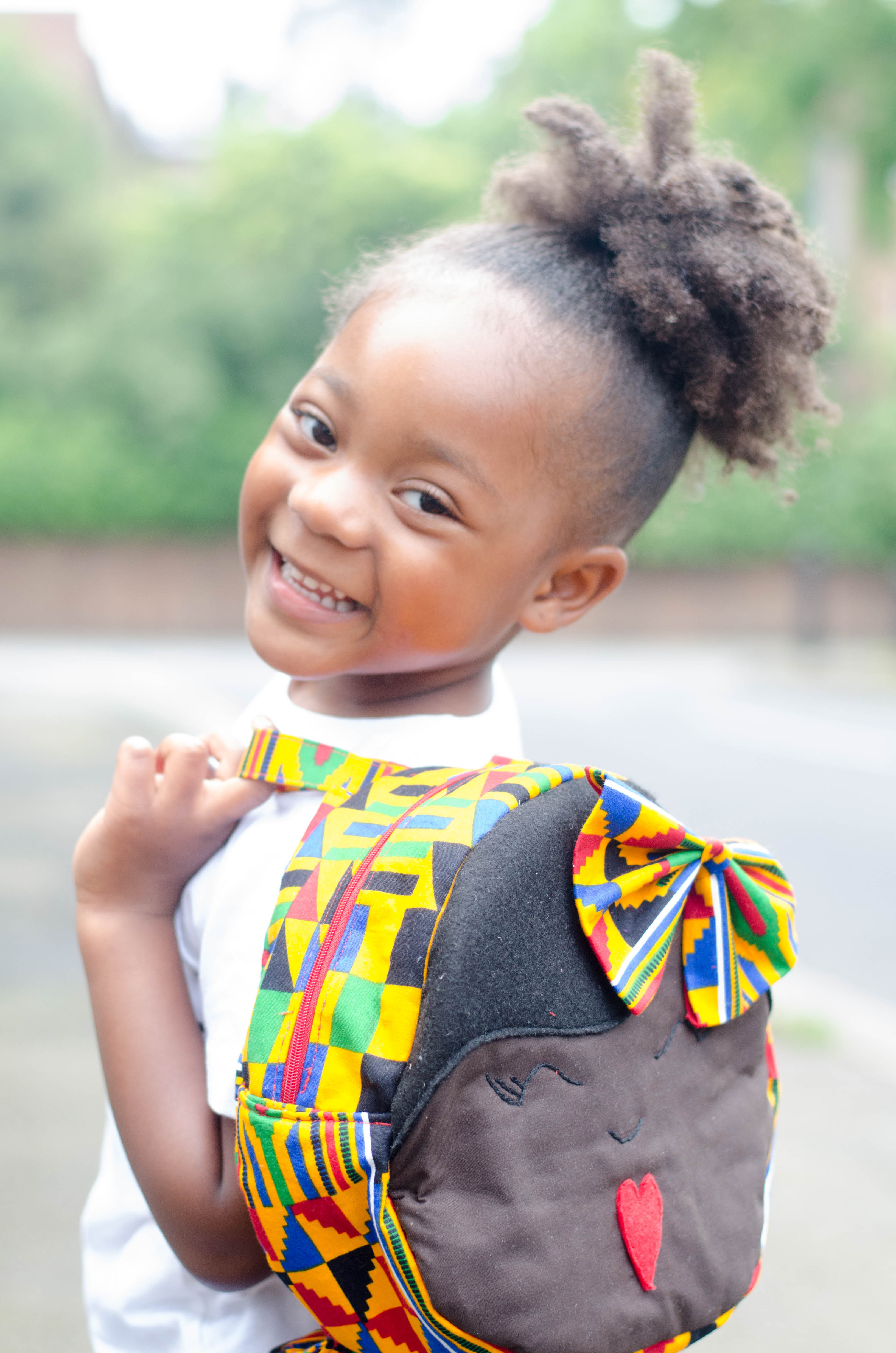 Kente Doll Face Backpack