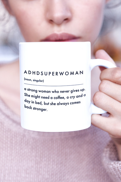 ASW Mug - Girl holding cup_edited.jpg