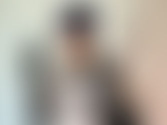 Suspicious-looking female robber wearing a mask and hoodie, holding weapons and a bag of money, conveying themes of crime, theft, and financial fraud.