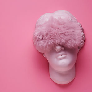 Greek goddess sculpture with sleep mask on pink background, sleeping concept.jpg