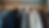 Eye-level view of a clothing rack displaying a variety of stylish shirts