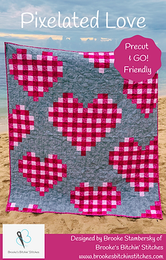 The cover of the Pixelated Love Quilt Pattern featuring a pink and red hearts design.