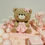 Thumbnail: Photo of a buttercream cake decorated with handmade teddy bear and other sugarpaste details.