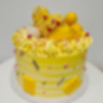 Photo of a Passion Fruit Coconut Cake with chocolate details