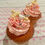 Thumbnail: photo of pink cupcakes with  vanilla buttercream and raspberry sponge.