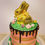 Thumbnail: Photo of a chocolate cake with a golden bunny on top