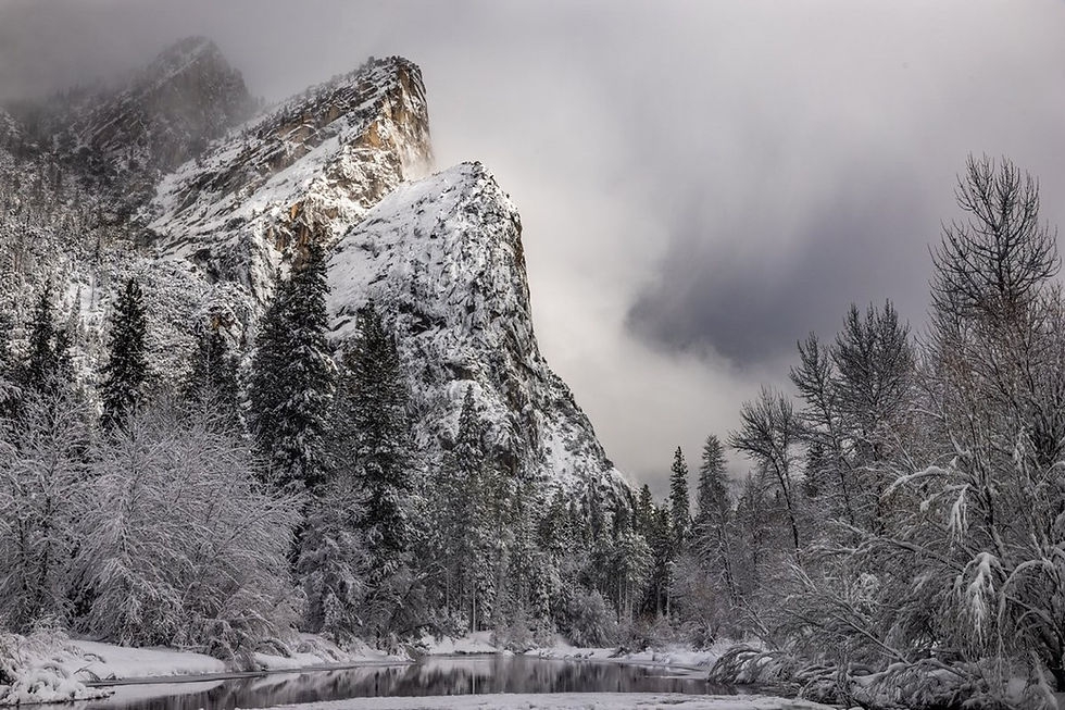The Three Brothers above the snow-covered Merced — nature photography in Yosemite Valley after a winter storm. | paulandersonphoto.com