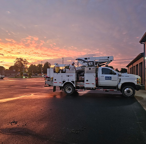Sunrise after the big storms through the night_crews heading out to do repairs