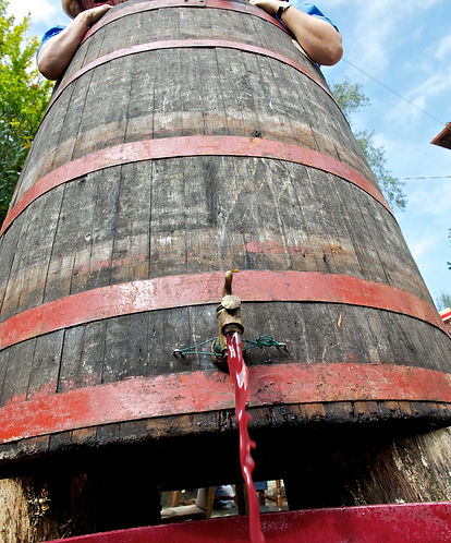 Barrel of Chianti red wine produced at Agriturismo Fattoria Celle, Tuscany, showcasing authentic Tuscan flavors.
