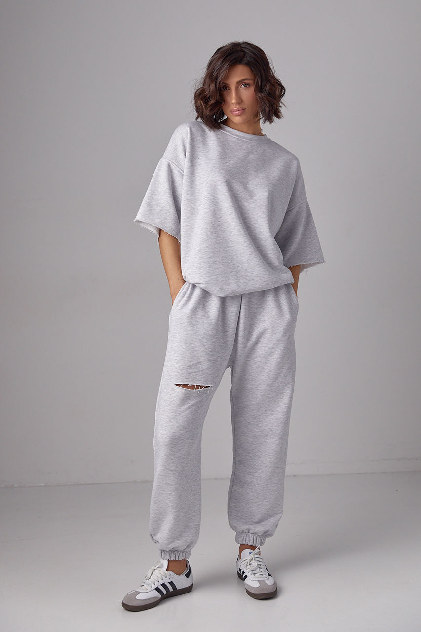 Спортивний костюм із трикотажу з прорізом на джогерах