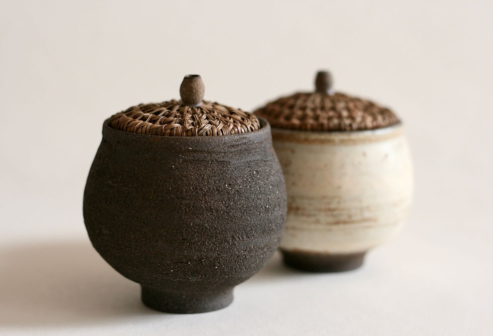 Thumbnail: Black round lidded woven pine needle