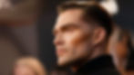 Showcase a side profile of a man with light contouring and groomed brows, emphasizing the subtle enhancement.
