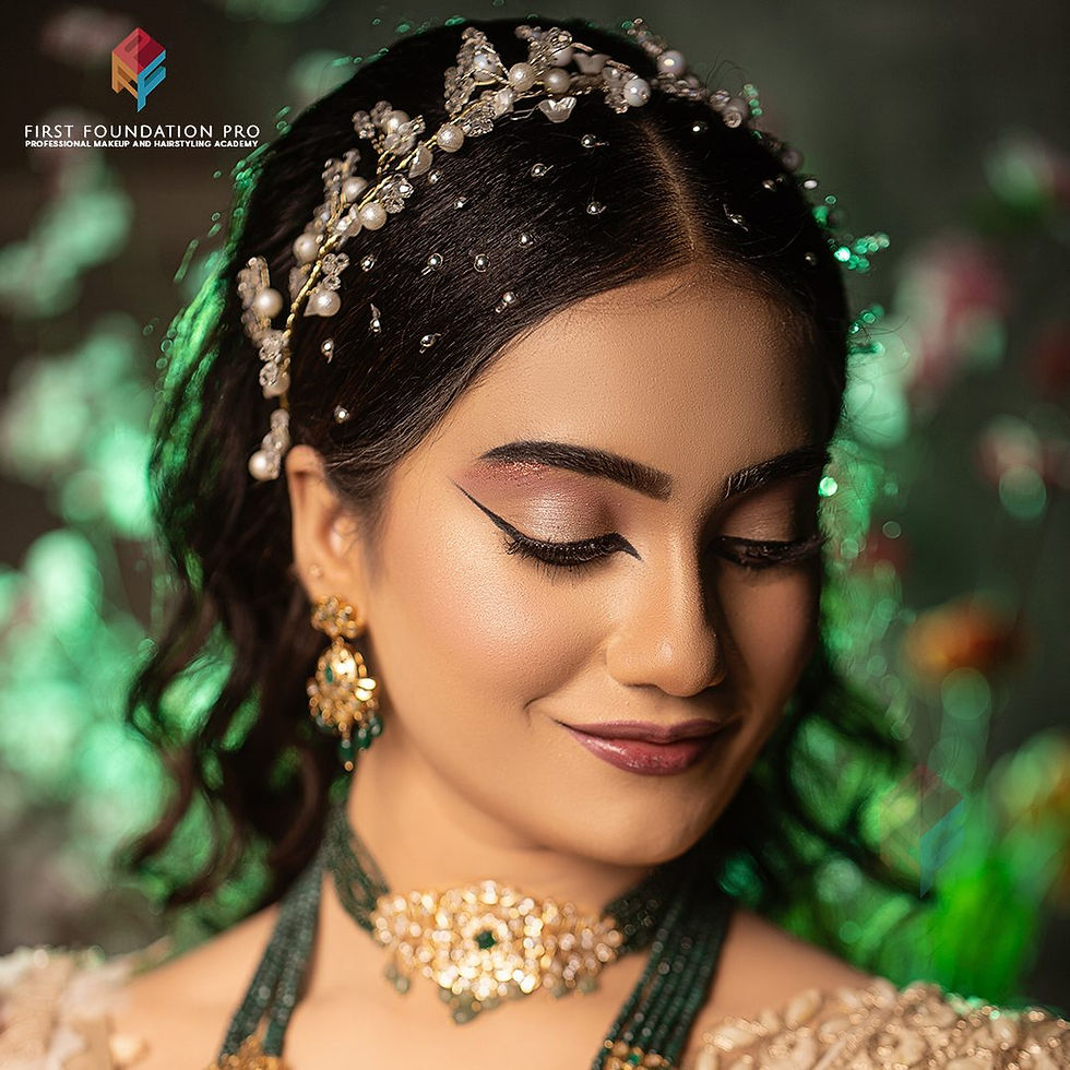 Glamorous party makeup with flawless winged eyeliner, radiant skin, elegant hairstyle and statement jewelry by First Foundation Pro, a professional makeup academy in Hyderabad offering makeup artist courses, fashion makeup training, bridal makeup classes and hairstyling certification.