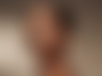 Indian woman wearing matte black lipstick with minimal makeup and glowing skin, representing the bold beauty trend of 2025.