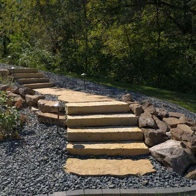 Natural stone built into a stairway by Knob Hill Landscape Company of Springfield, Illinois. 