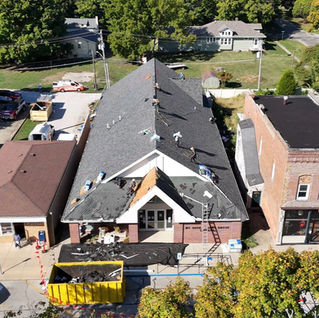 A commercial library under construction for a new roof replacement by I-57 Roofing
