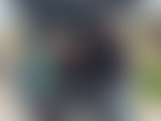 DBS Rescue Founders with Staff From Collin County Animal Services smile from the back of DBS Rescues blue car with first rescue a nearblack brindle bostonterrier, french bulldog, pug, pit mix!