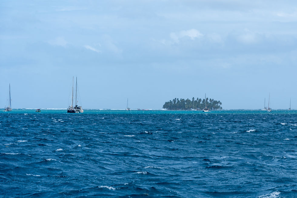 Wide angle view of a sailboat on a calm sea