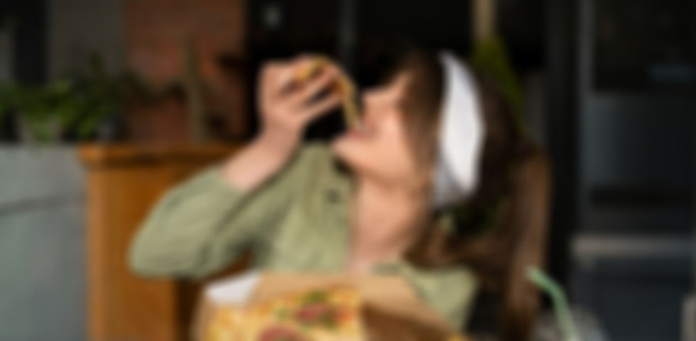 front-view-woman-with-delicious-pizza_23-2150347911_edited_edited_edited.jpg