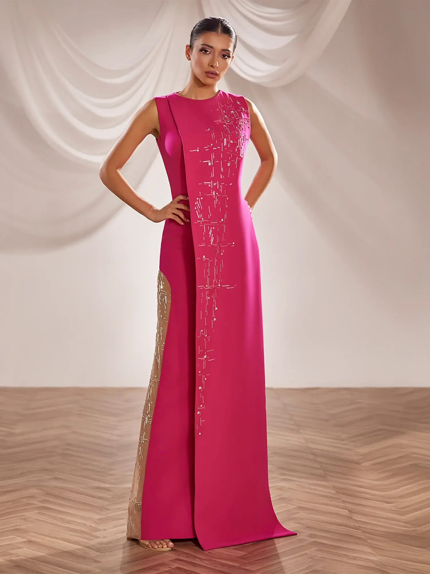 SS252- Fuchsia crepe gown with a front cape