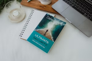 Books with laptop beside them