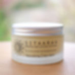Glass jar containing skin balm