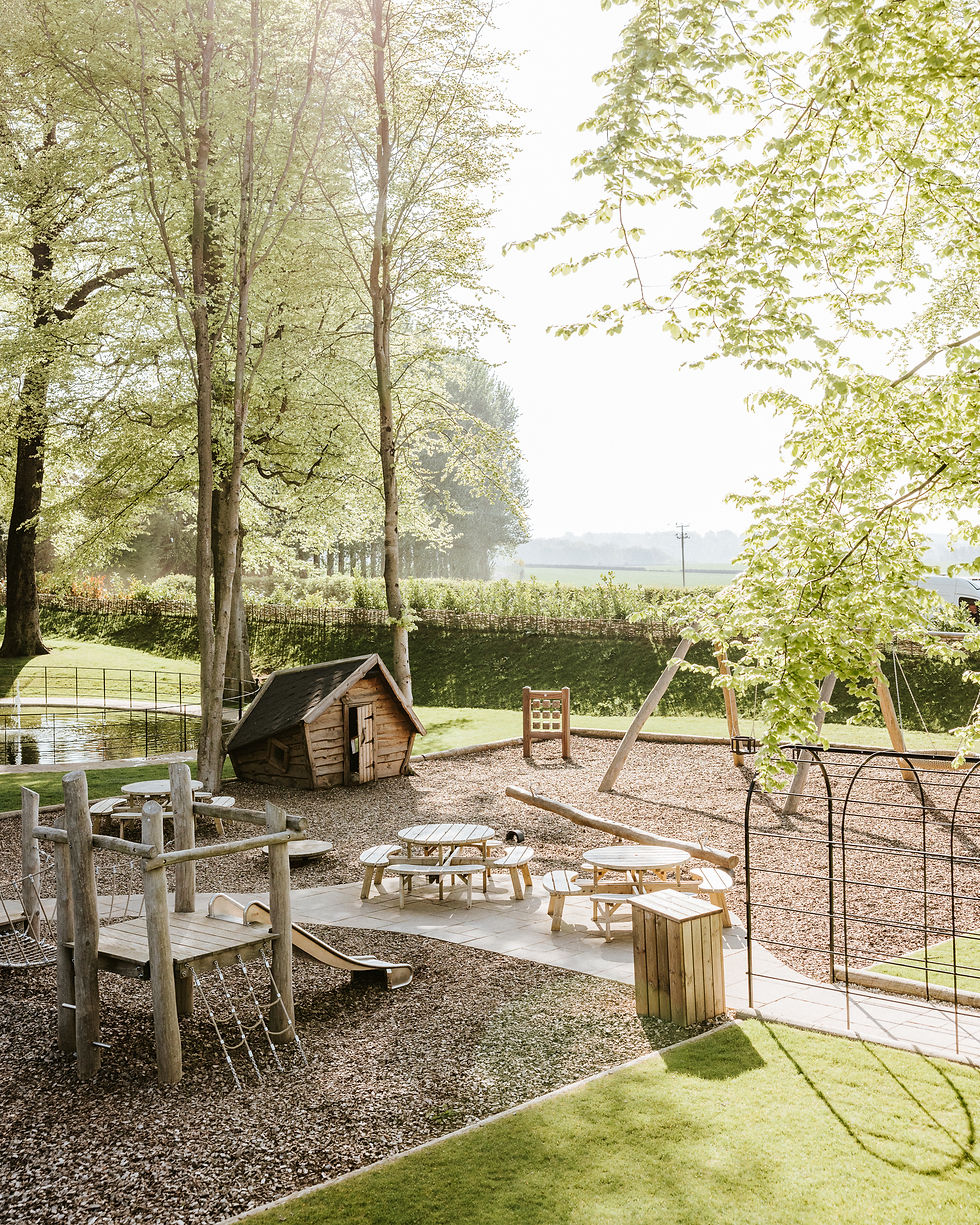 Wooden playground in rural setting