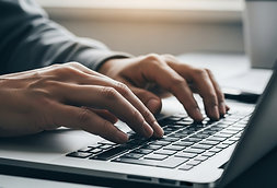 hands using computer.png