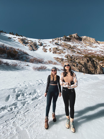 two girls posing at st marys glacier hike
