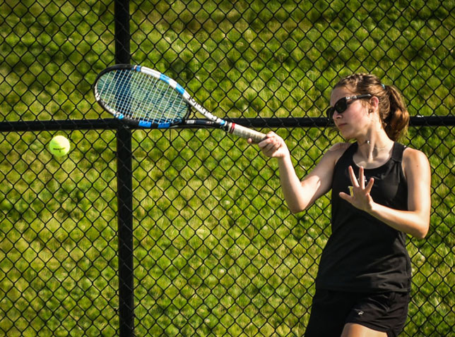 ADDIE PATTERSON and teammate Cassidy Stiefel lost in a third-set tiebreaker at the state tournament June 1. The duo was among the youngest in the tournament. (Photo by Bill Caine)
