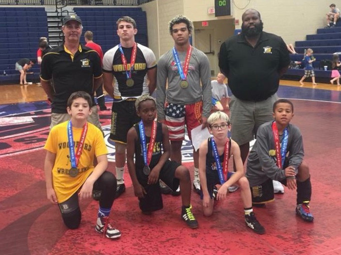 WOODFORD WRESTLING CLUB won 12 gold medals, (16 total) in the Alabama State Games June 9. Front are , Jeffrey Temprano, Nikko Strong-Walker, Brycen Gray, and Braylen Livingston; back, Coach Mike Andreoni, Wyatt Andreoni, Triston Brooks and Coach Jarvis Livingston. (Photo submitted)