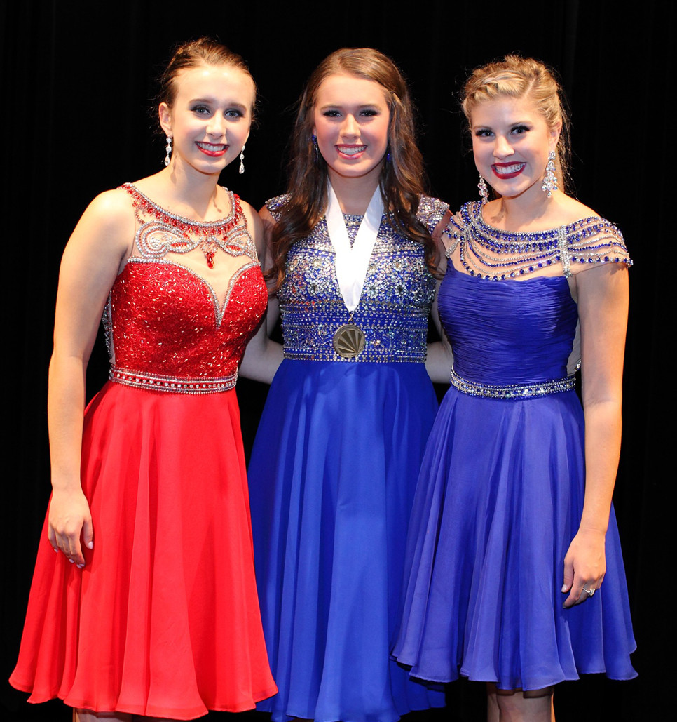TURNER REYNOLDS, center, was named the Distinguished Young Woman of Woodford County on Saturday, Aug. 19. At left is Olivia Back, first runner-up, and at right is second runner-up Rebekah Hall. (Photo by John Hemlepp)