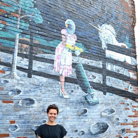 ‘Out of this World’ mural adds whimsy to her hometown