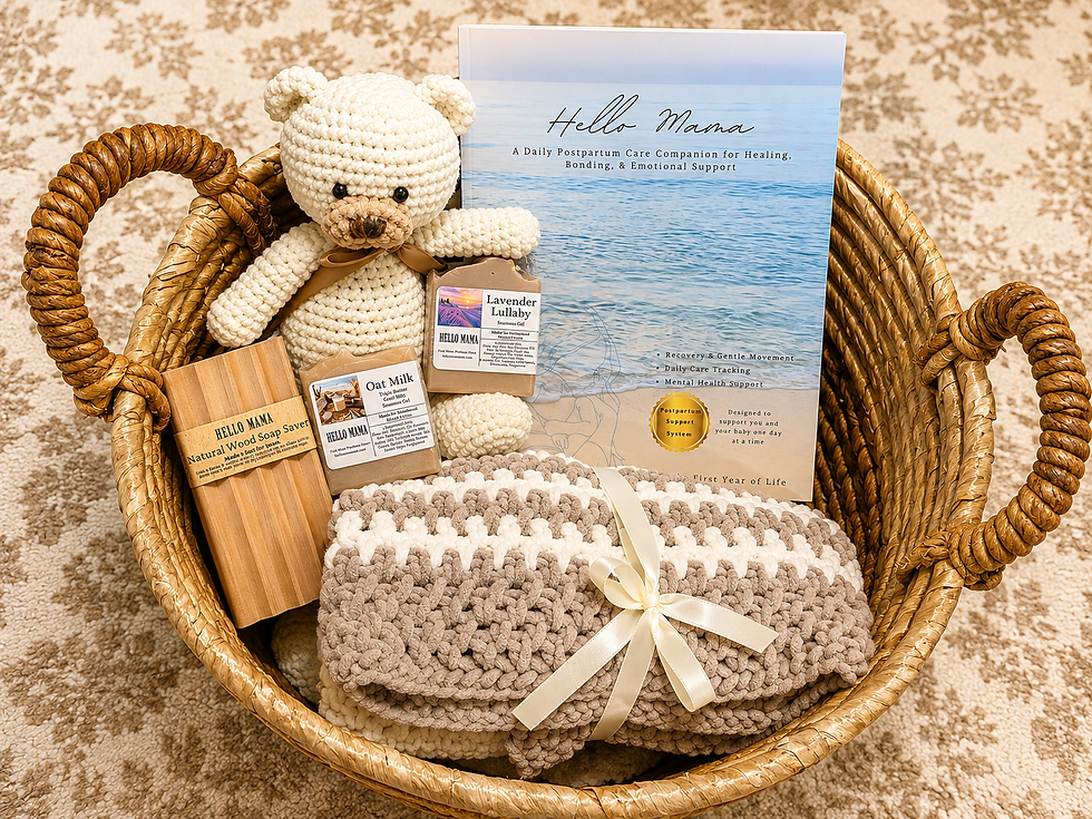 Eye-level view of a postpartum gift bundle with a book, soaps, bear, blanket, and wooden soap saver