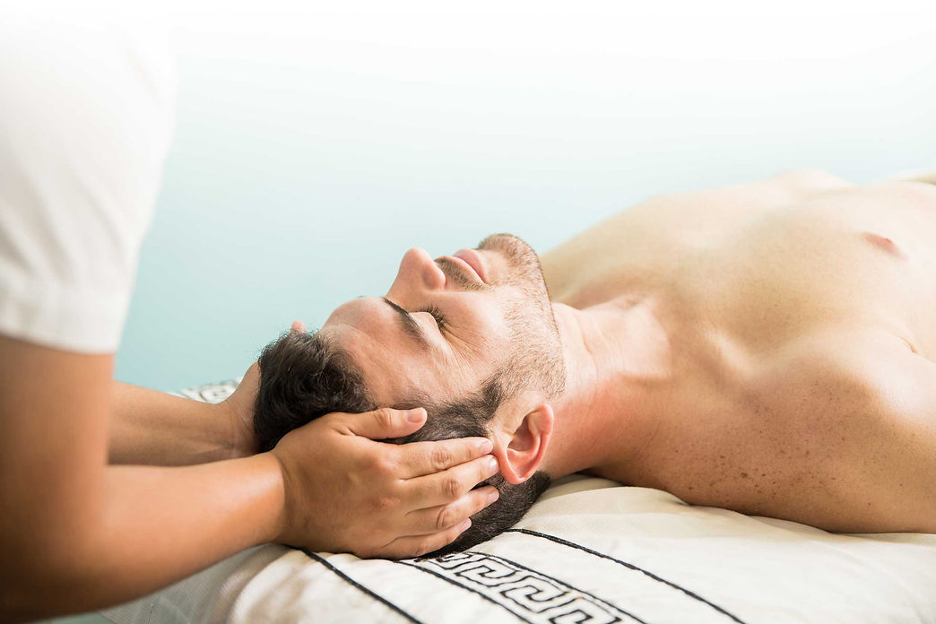man recieving a indian head massage