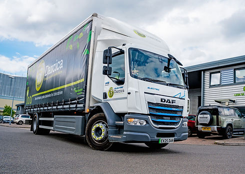 White DAF delivery truck with company branding.