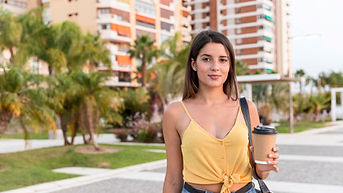 front-view-young-woman-posing-with-coffee-cup in Brazil