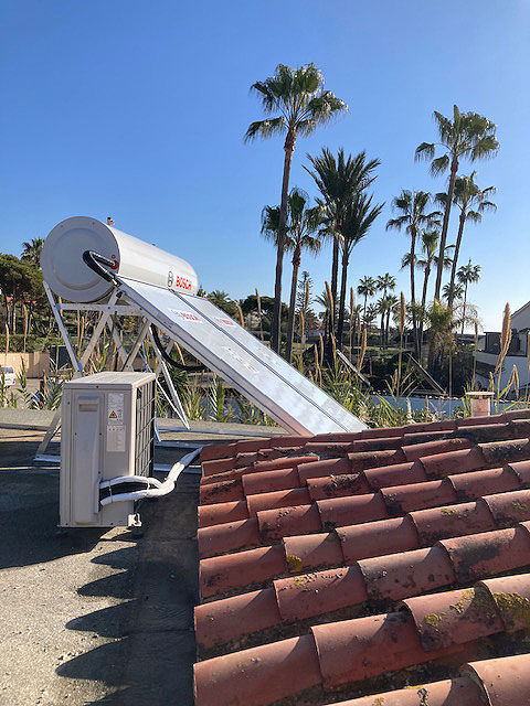 Solar water heater on a roof in Mijas