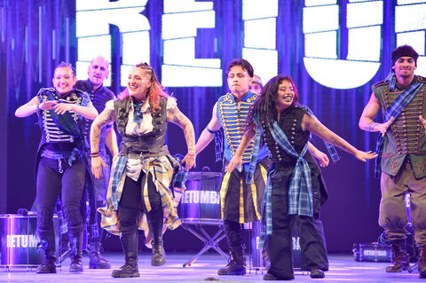 Performers dancing on stage at a RETUMBAR show