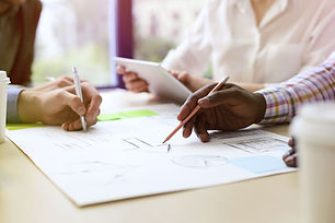 business-adviser-analyzing-financial-figures-denoting-progress-work-company
