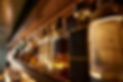 bar-counter-with-many-bottles-alcoholic-drinks-assortment