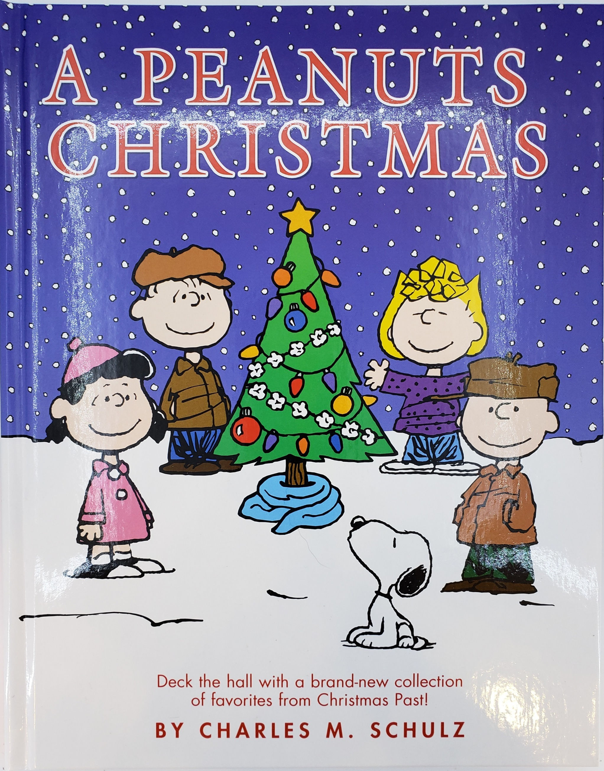 THE JOY OF A PEANUTS CHRISTMAS, 50 Years of Holiday Comics! by Charles S