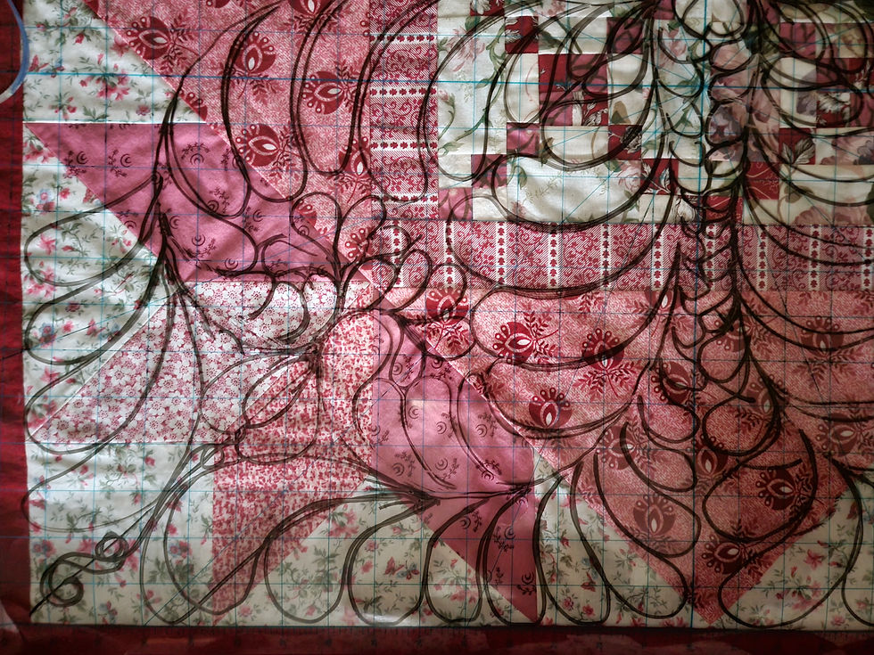 Abstract patchwork of pink, red, and cream floral fabrics over blue grid paper, crisscrossed by dark looping lines; busy, handmade feel