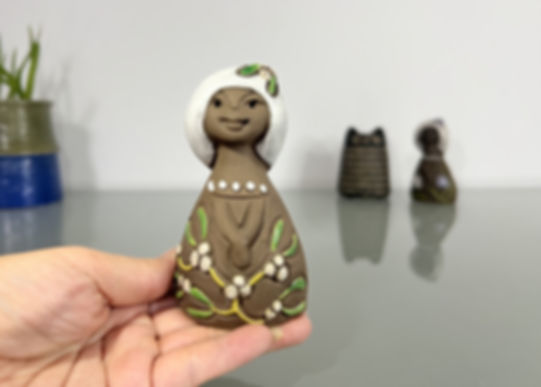 Tore Borg, Girl with White Flower Figurine