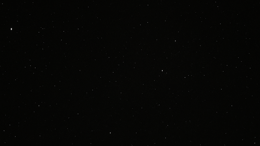 A dark starry black void that represents entering the status quo of American business and work culture.