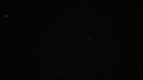 A dark, black, starry sky backdrop that represents entering the status quo of American business and work culture, with the glowing words: “Who Said The Revolution Won’t Be Televised”.