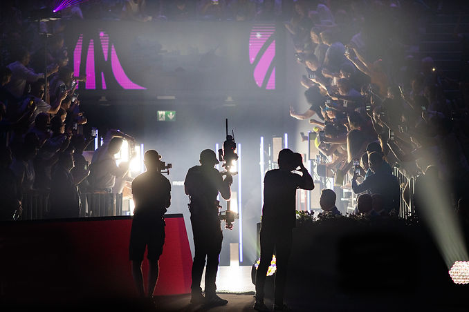 cameraman-silhouette-filming-during-event-2025-03-26-00-38-54-utc.jpg