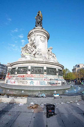 Paris’s defaced Monument to the Republic.