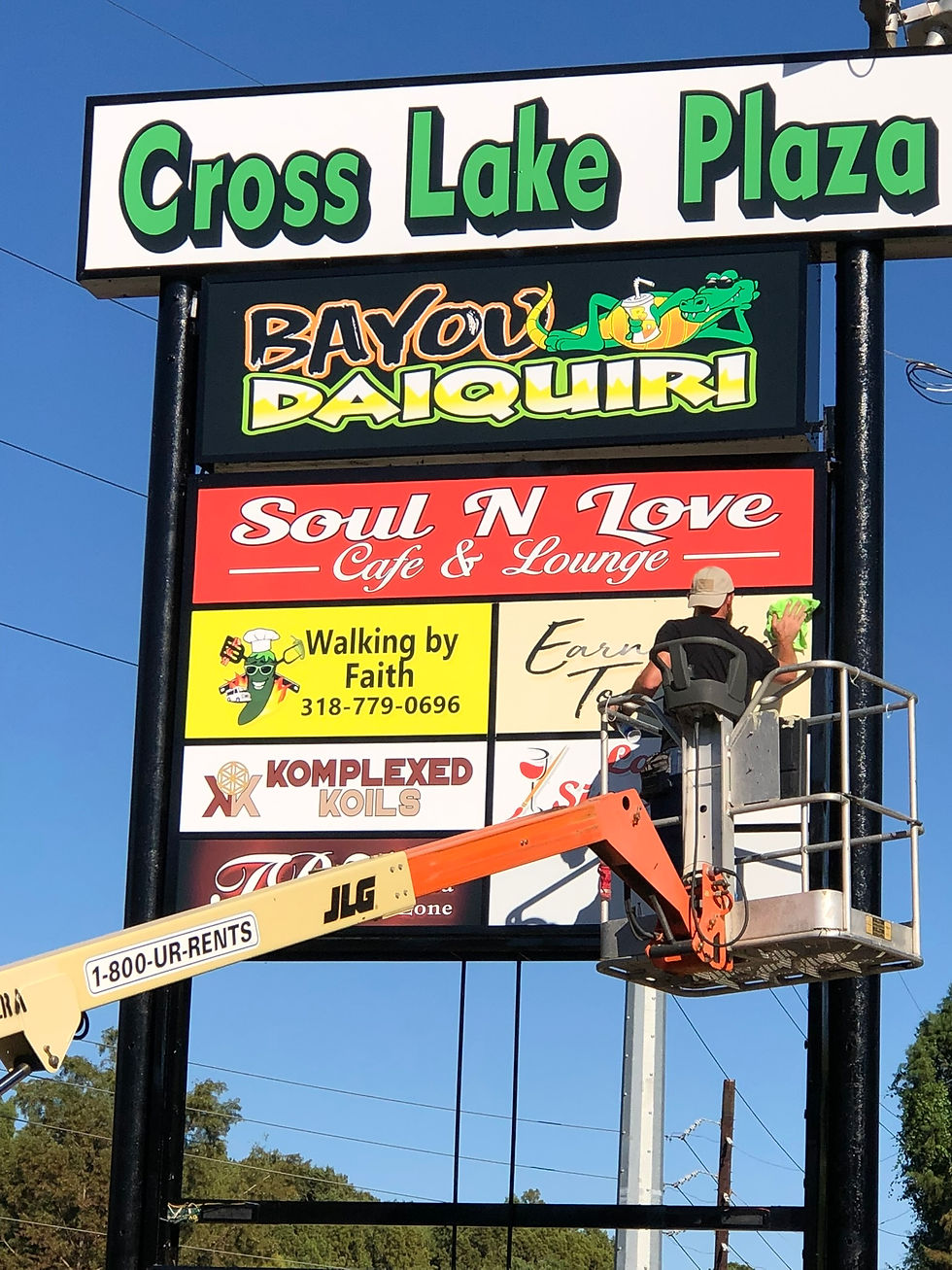 Cross Lake Plaza - Restoration of a complete multitenant Monument sign.  Working off a lift cleaning