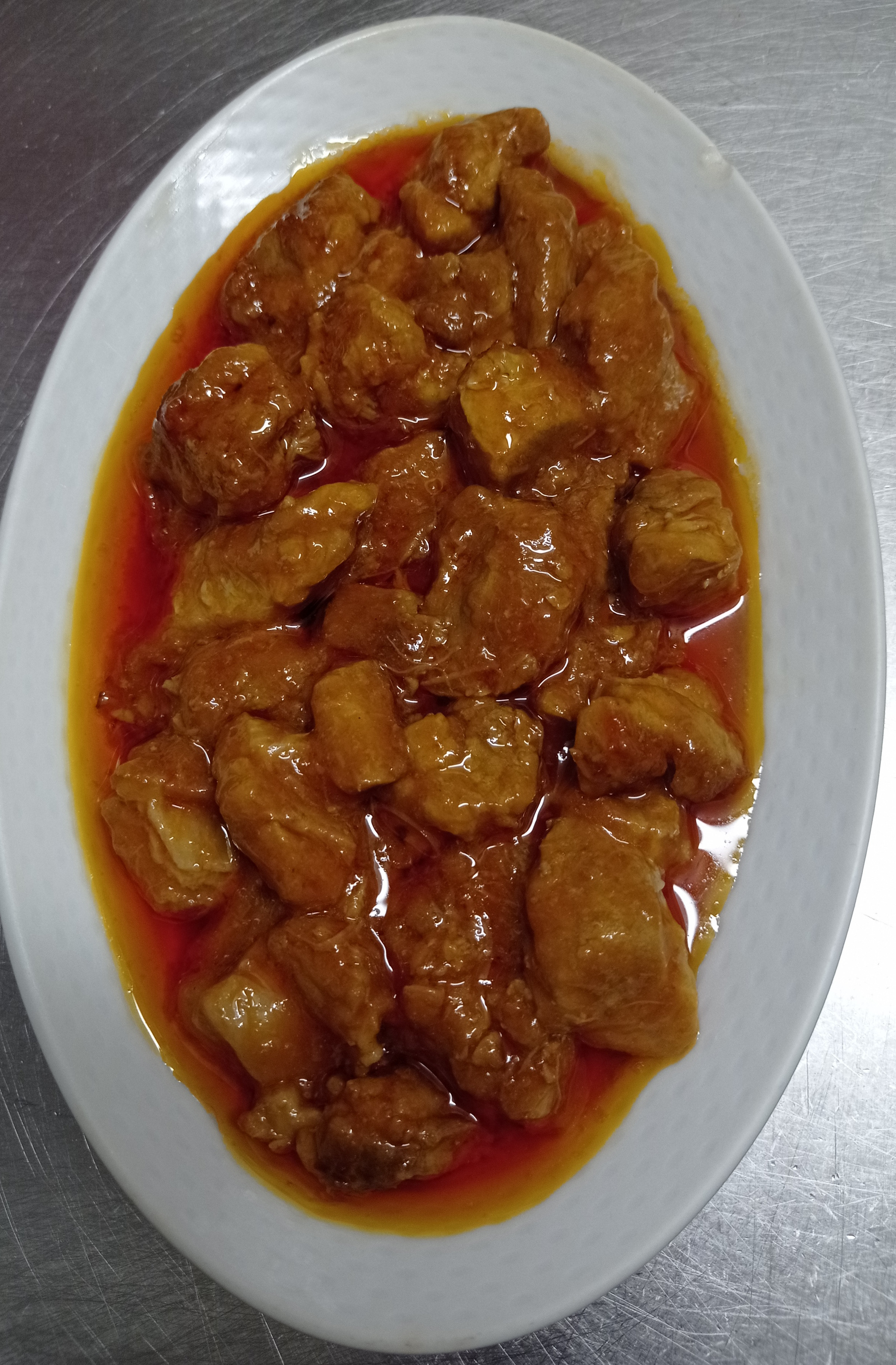 Carne con tomate